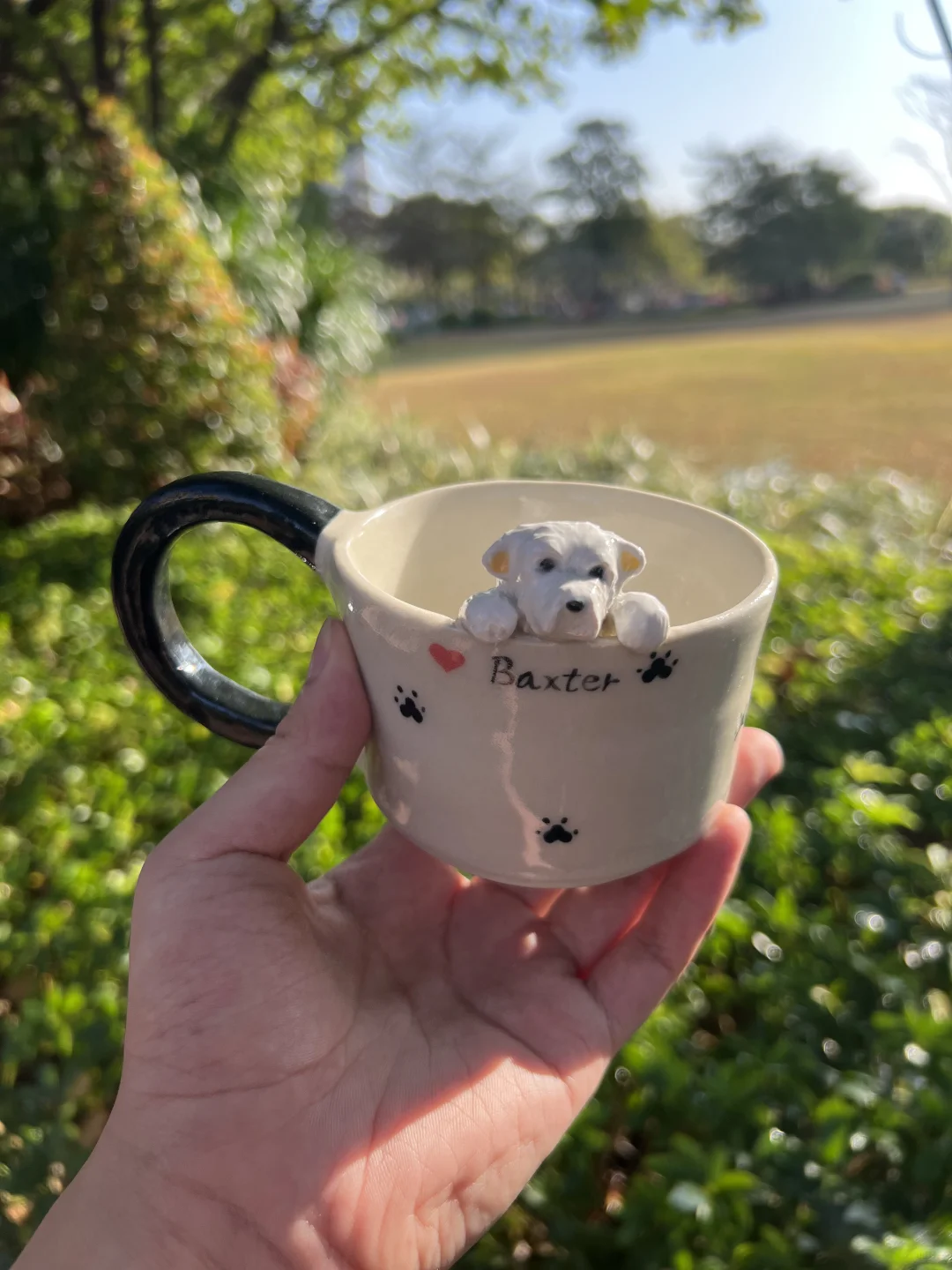 Custom pottery cup pet on the edge