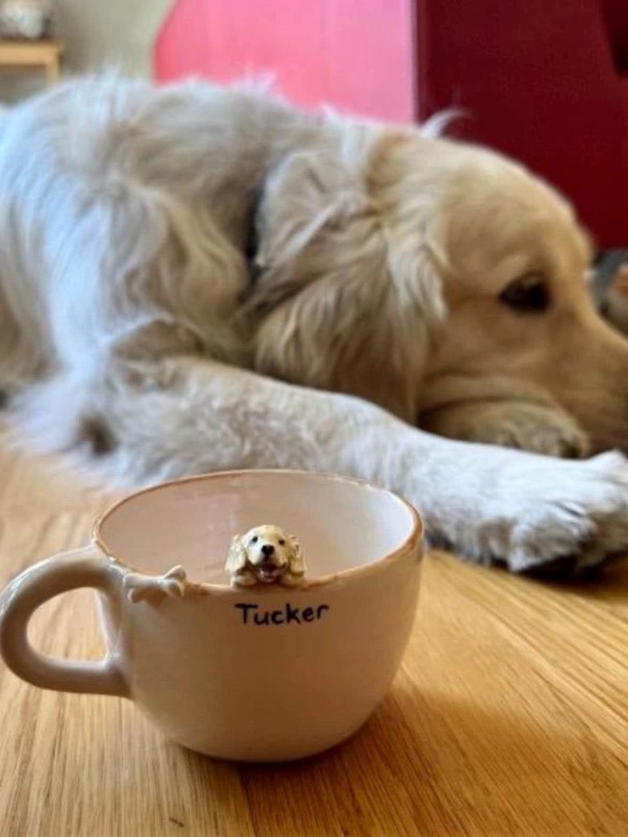 Custom pottery cup pet on the edge